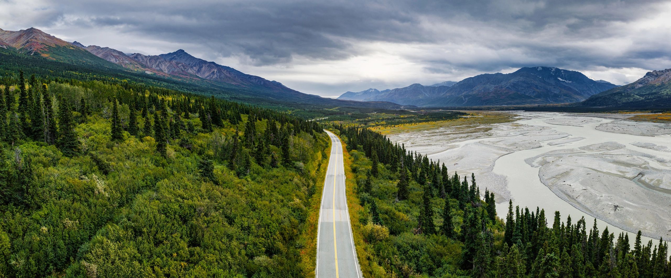 Aerial view of a highway running through Alaska’s Delta River Valley